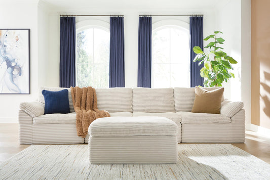 Ashley Express - Fannin 4-Piece Sectional with Ottoman
