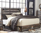 Drystan King Panel Bed with 2 Storage Drawers with Mirrored Dresser, Chest and 2 Nightstands